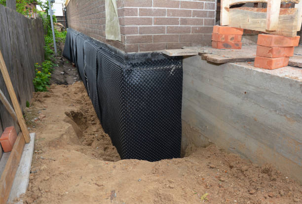 Happy homeowners after waterproofing job in Greenback